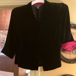 Velveteen jacket or top.  Pretty and great party stuff.